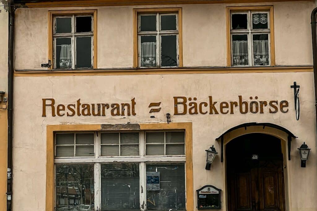 An old restaurant building with a sign that says "Blackhorse.
